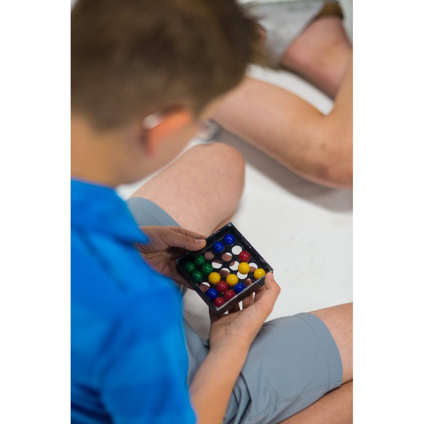 Discovery Toys Tricky Fingers Handheld Marble Race Challenge